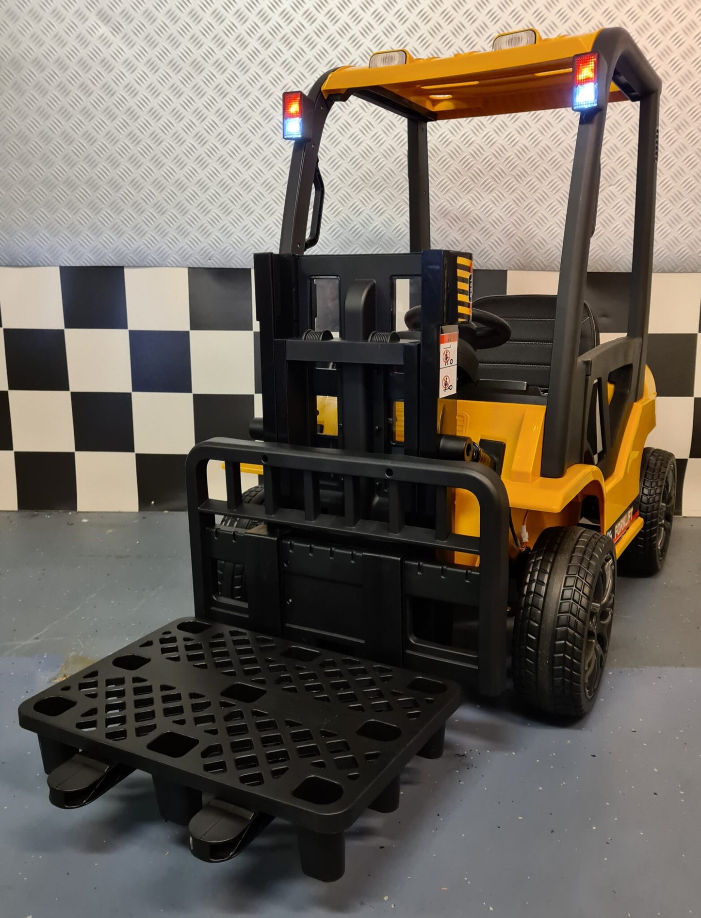 Elektrische kinder heftruck 12volt met afstandsbediening geel
