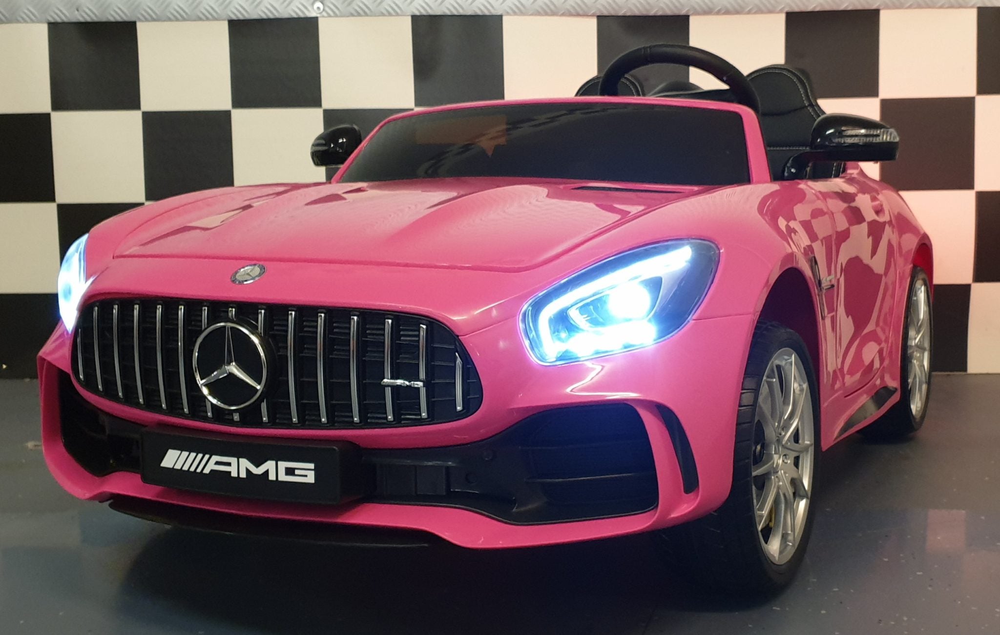 Kinderauto Mercedes 2 persoons AMG GTR 2x12 volt 4WD roze