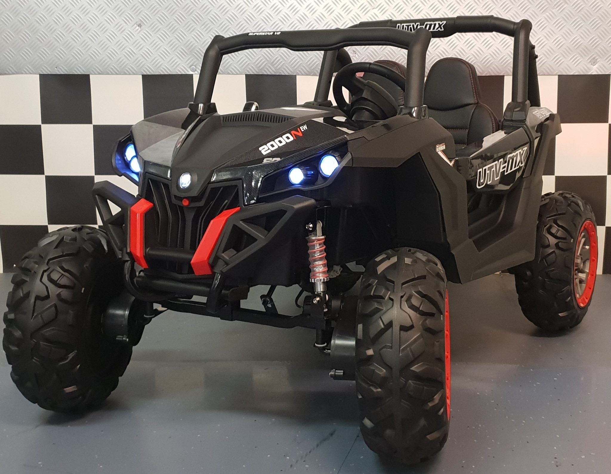 Accu kinderauto 2 persoons buggy 4WD 2x12V 2.4G RC carbon