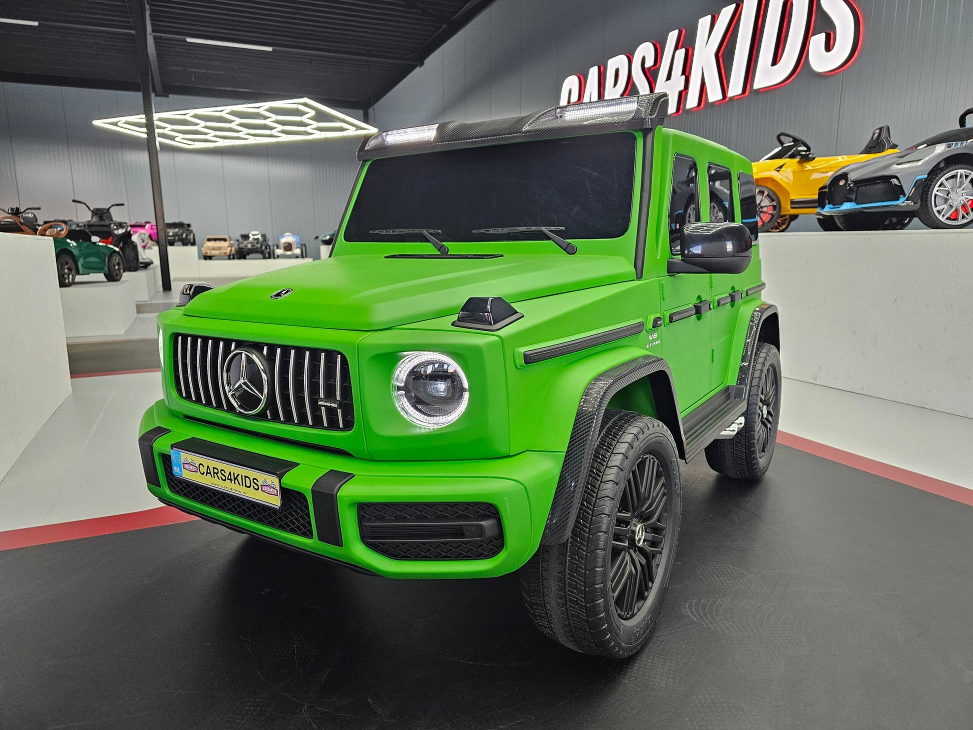 Elektrische kinderauto Mercedes G63 AMG 4x4 24 volt mat groen
