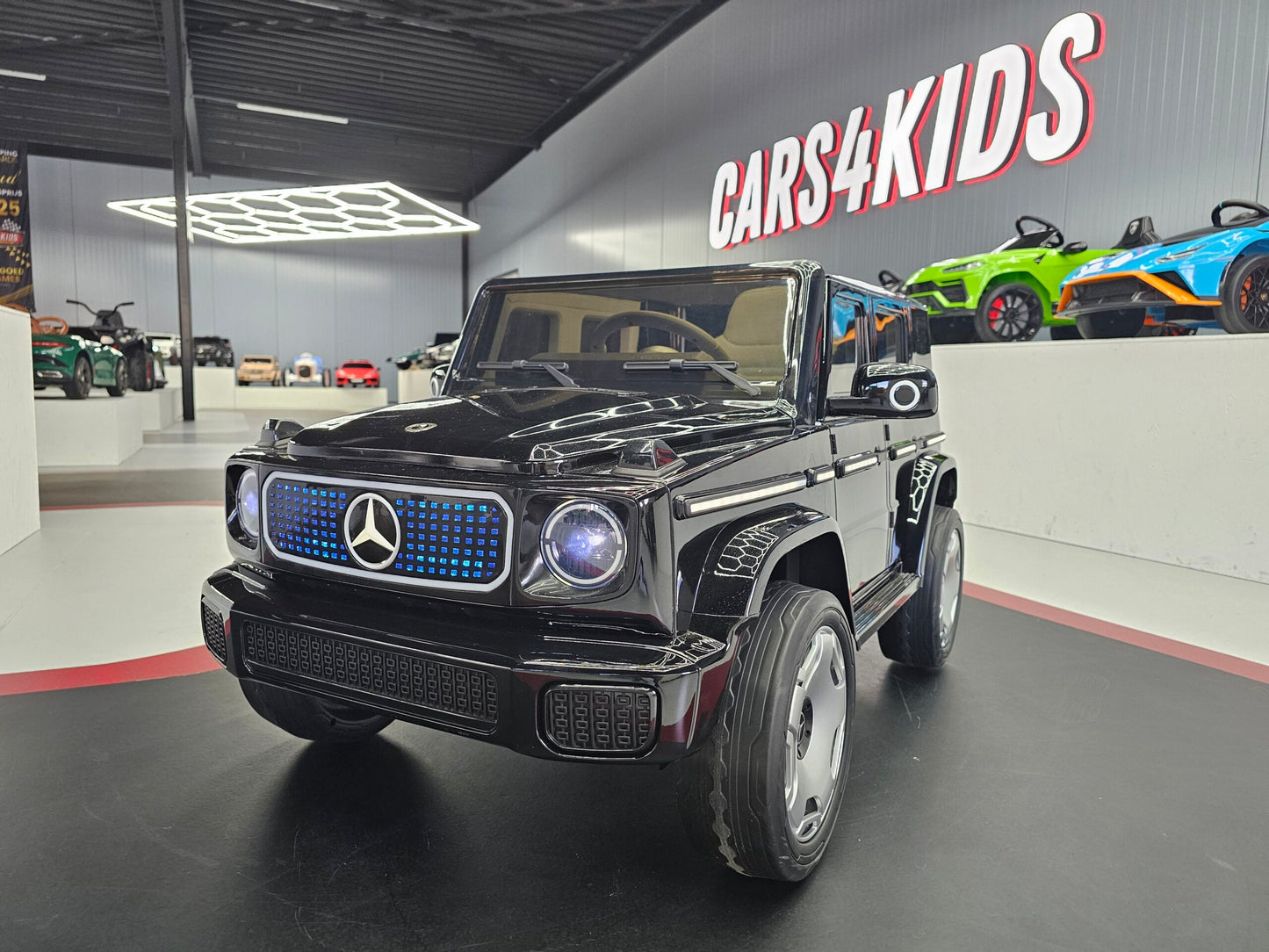 Elektrische kinderauto Mercedes EQG zwart 12 volt