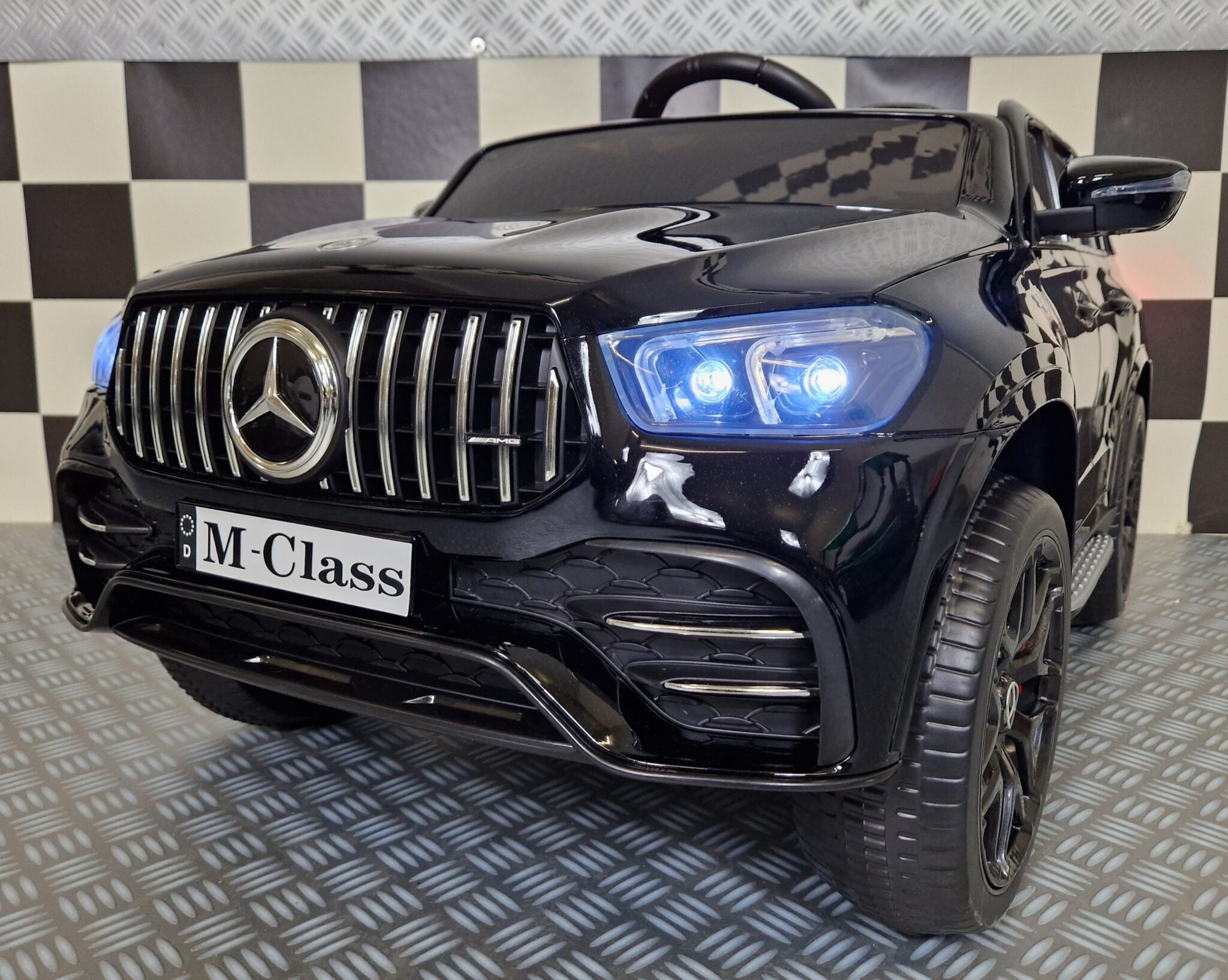 Elektrische kinderauto Mercedes GLE 53 metallic zwart