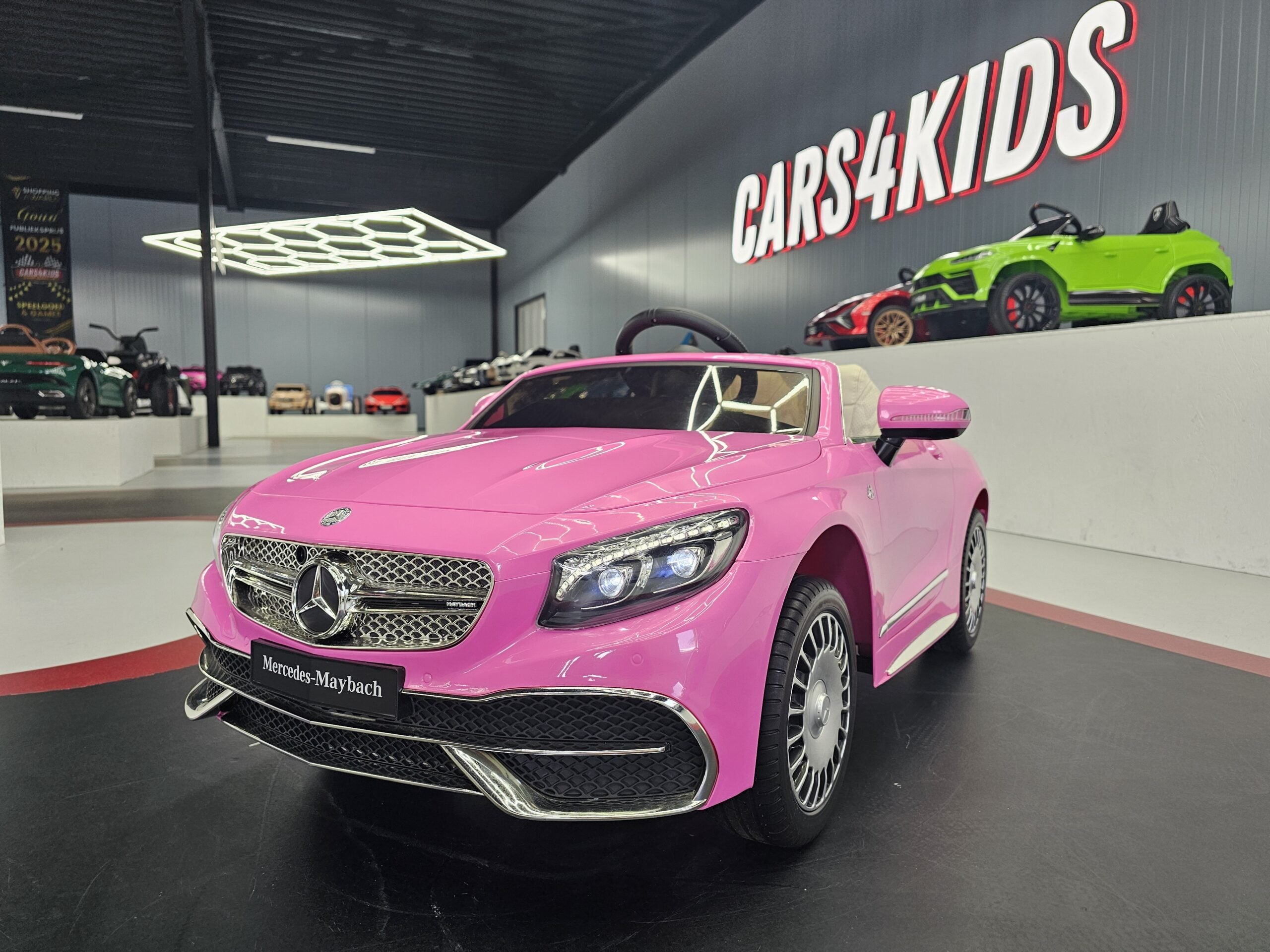 Elektrische kinderauto Mercedes Maybach S650 roze 12 volt met soft start